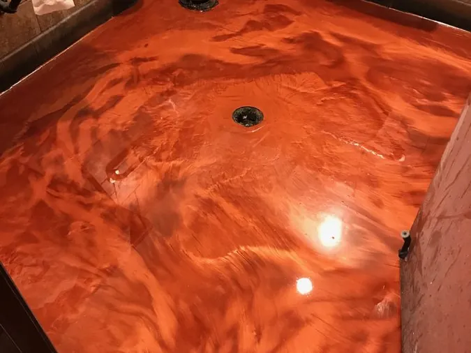 Shower pan finished in copper metallic epoxy