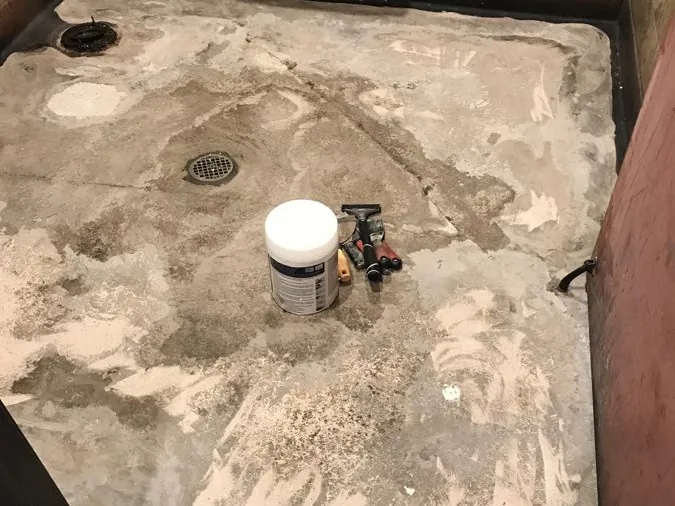 Shower pan before metallic epoxy coating